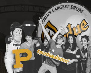 students in front of the Purdue drum with Purdue Pete